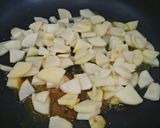 A picture of step 4 of Batatyaachya kaachryaa (stir fry potato vegetable).