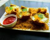 A picture of step 11 of Eggs In Baked Basket.