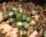 A picture of step 3 of Alu meethi (fenugreek leaves).