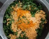 A picture of step 4 of Moogdal with spinach.