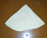 A picture of step 5 of Triangle paratha.