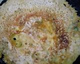 A picture of step 2 of Besan ka cheela.