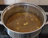 A picture of step 3 of Ginger Turmeric tea. (kadha).