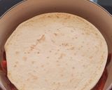 A picture of step 9 of Enchilada Lasagne.