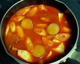 A picture of step 7 of Tomato and Miso Autumn Vegetable Kenchin Soup.