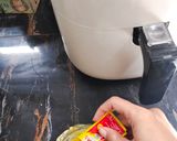Foto langkah ke 2 dari resep Jagung bakar air fryer pedas manis.