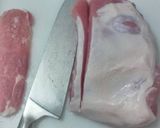 A picture of step 2 of Tender seasoned pork loin cuts.