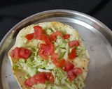 A picture of step 2 of Masala papad or salad on papad.