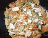A picture of step 4 of Omelette sandwich.