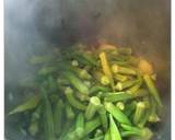 Okra in a terracotta casserole dish recipe step 6 photo