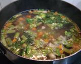 A picture of step 2 of Dj's Veggies Tomato Soupy Noodles.