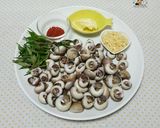 Hình bước làm 1 của món Ốc Mỡ Xào Bơ Tỏi