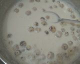 A picture of step 3 of Makhana kheer and jalebi parfait.