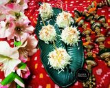 A picture of step 15 of Khichi rice flowers balls.