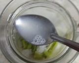 A picture of step 2 of Kiwi mint mojito 🥝🥝.
