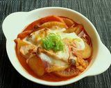 A picture of step 10 of Tomato and Miso Autumn Vegetable Kenchin Soup.
