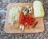 A picture of step 1 of Green Papaya Salad.