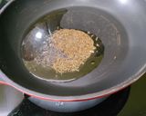 A picture of step 2 of Red Poha Masala With Veggies, Sprouts and Nuts.