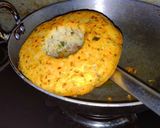 A picture of step 5 of Dibba roti or meenapa roti.