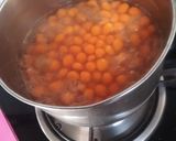 A picture of step 7 of Mango Boba Drink (with homemade mango bubbles).
