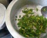 A picture of step 3 of Turmeric rice and beans.