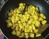 A picture of step 4 of Raw Mango Vaghariyu / Sweet & Sour Mango Pickle.