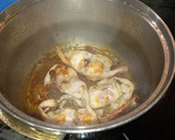 Foto del paso 4 de la receta: Conejo al ajillo, con patatas fritas
