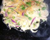 A picture of step 4 of Onion egg fry.