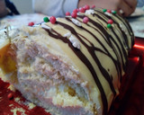 Foto del paso 9 de la receta: Enrollado o brazo de gitano con crema de naranja y chocolate