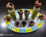 A picture of step 4 of Chocolate golgappa with paan shots.