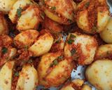 A picture of step 3 of Stuffed Potato Curry (garam masala).