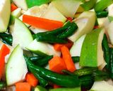 A picture of step 3 of Spicy Mango Carrot & Chilli Pickle.