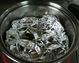 A picture of step 11 of Comforting Chikuzen-ni (Japanese Simmered Chicken and Vegetables).