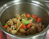 A picture of step 13 of Comforting Chikuzen-ni (Japanese Simmered Chicken and Vegetables).