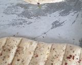 A picture of step 10 of Stuffed Garlic bread.