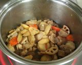 A picture of step 12 of Comforting Chikuzen-ni (Japanese Simmered Chicken and Vegetables).
