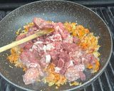 A picture of step 3 of Neapolitan-Style Ragù on the BBQ.