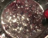 A picture of step 8 of Lemon Pepper Chicken with a Blueberry Orange Wine Sauce.
