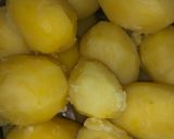 A picture of step 1 of Boiled irish potato with carrot egg sauce.