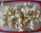 A picture of step 1 of Roasted Cauliflower with Crispy Parmesan.