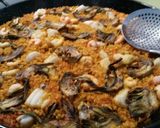 A picture of step 9 of Seafood paella with artichokes.