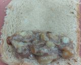 A picture of step 2 of Banana cinnamon bread rolls with chocolate syrup garnish.