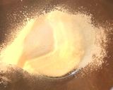 A picture of step 3 of Cannelé de Bordeaux.