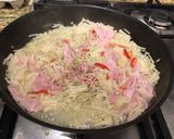 A picture of step 3 of Pan fry enokitake with bacon 🥓.