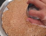 A picture of step 4 of Til & peanut crush chikki.