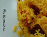 A picture of step 9 of Basanti Pulav/ Bengali Misti Pulao.