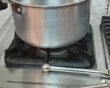 A picture of step 1 of Kadak garam masala chai.