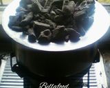 A picture of step 11 of Mini buns using charcoal jiko.
