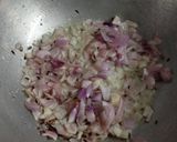 A picture of step 2 of Dry chana massala.