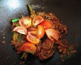 A picture of step 6 of Peyajkoli Dim (Egg cooked with Spring Onion).
